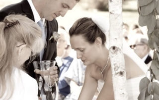 Lighting a candle during the Wedding Ceremony Ceremony